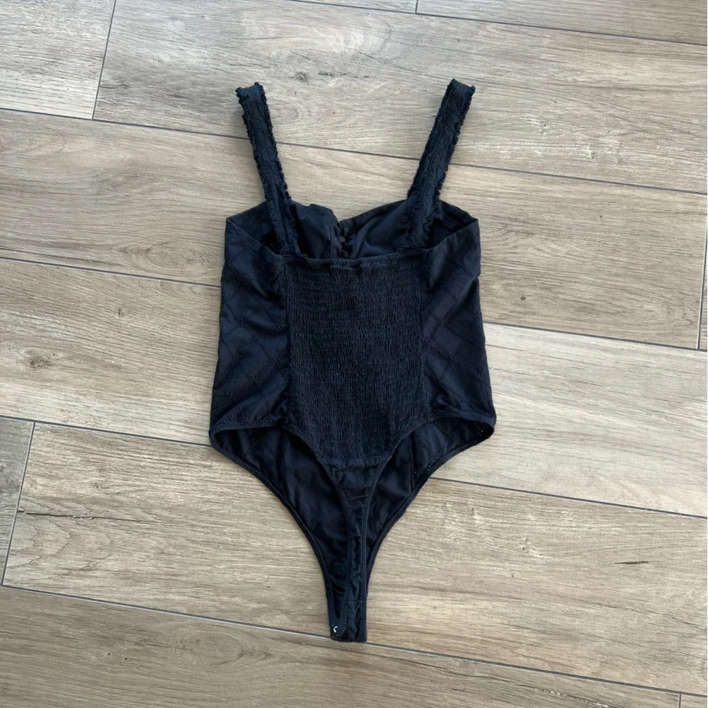 ✨HP✨FREE PEOPLE Make Me Up Lace Up Eyelet Thong Bodysuit Black S